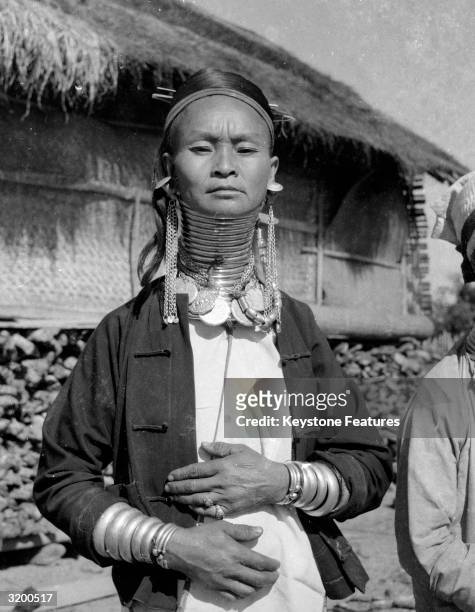 Female member of the Padaung tribe in Myanmar, , wearing brass rings in order to lengthen her neck.