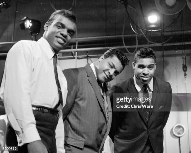 Ronald, Rudolph and O'Kelly; gospel influenced pop vocal group The Isley Brothers, performing on the British television show 'Ready Steady Go'.