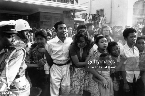 People jostling in the street during the Bandung Conference held at Bandung in Indonesia.