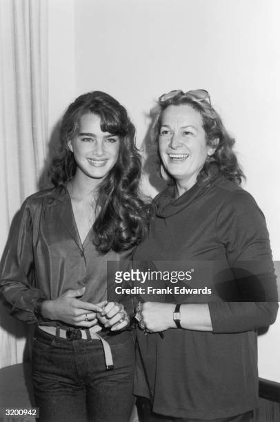 American model and actor Brooke Shields smiles while posing with her mother, Teri Shields, at a Hollywood Foreign Press Association brunch, Beverly...