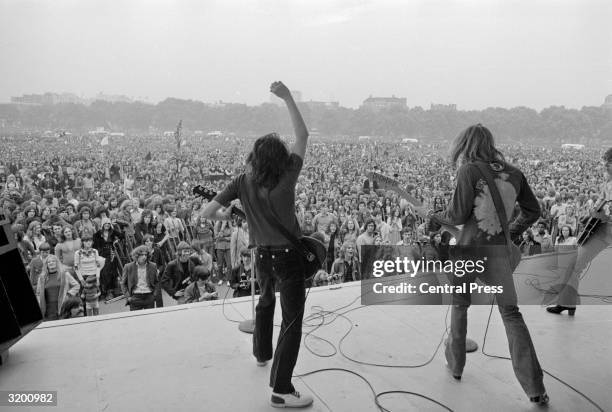 From left to right: Peter Frampton and Steve Marriott of the group, 'Humble Pie' at a free open-air pop concert in Hyde Park, London.