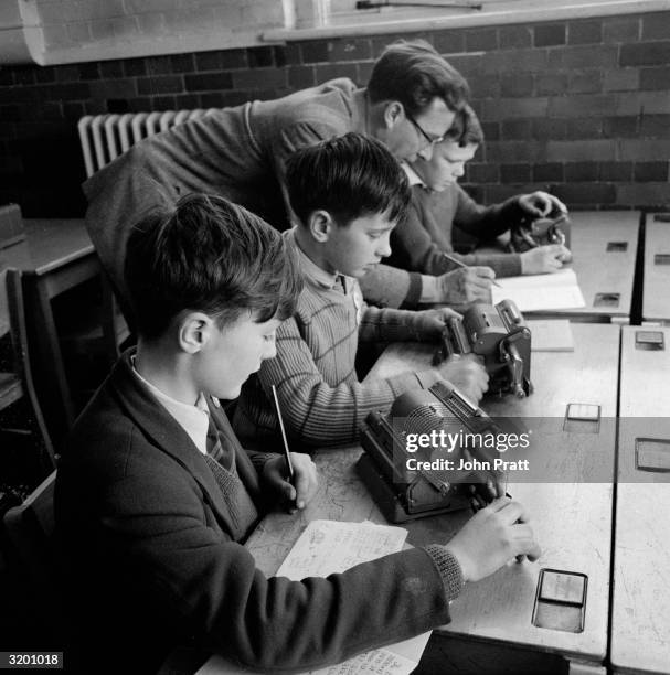 Peter Using Computer 1,376 Computer Used In Education Stock Photos, High-Res Pictures, and ...
