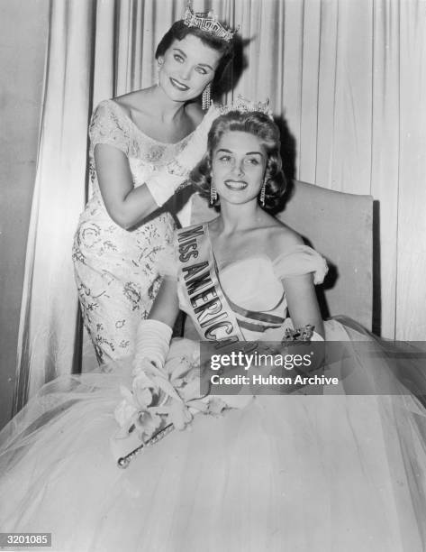 Miss America 1957, Marian Ann McKnight of South Carolina, being crowned by the retiring Miss America of 1956, Sharon Kay Ritchie, Atlantic City, New...