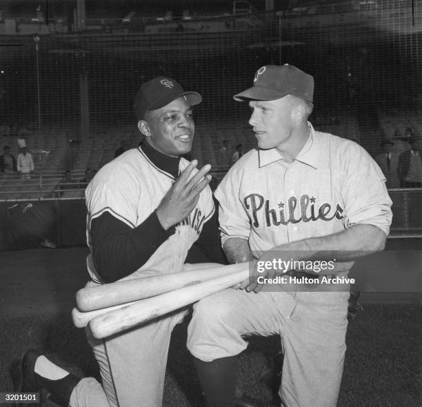 American baseball players Willie Mays , center fielder for the San Francisco Giants, and Richie Ashburn, center fielder for the Philadelphia...