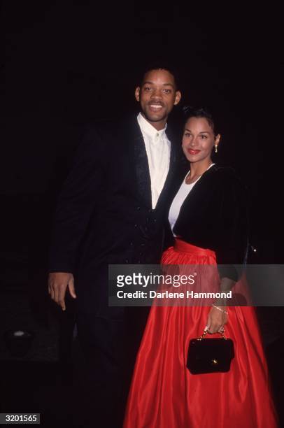 Portrait of American actor and rapper Will Smith with his first wife, Sheree Zampino, in formal dress. The couple divorced in 1995.