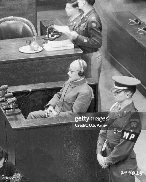 Former Japanese prime minister and minister of war Hideki Tojo takes the stand to testify in his own defense, during the International Tribunal for...