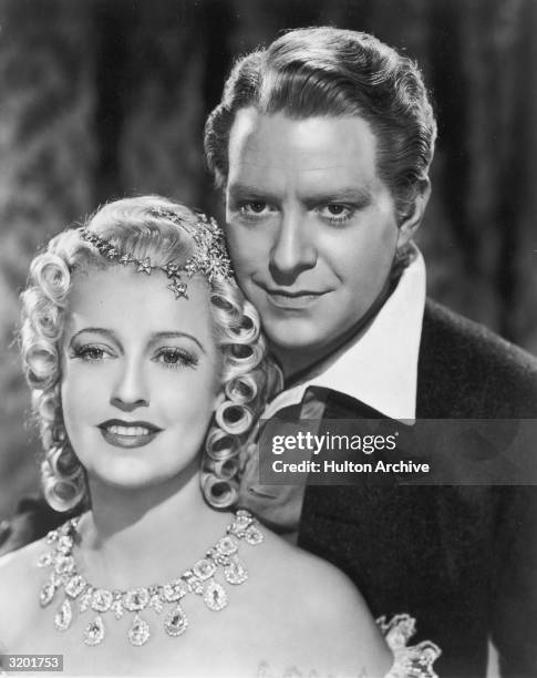 American singers and actors Nelson Eddy and Jeanette MacDonald pose together in a promotional portrait for director Robert Z. Leonard's film 'New...