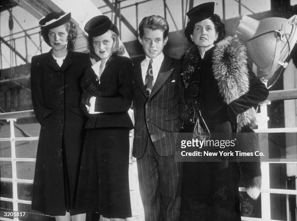 American matriarch Rose Kennedy with three of her children, Eunice, Kathleen, and Bobby.