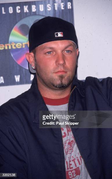 Headshot of American singer Fred Durst, frontman for the metal/punk/hip-hop group Limp Bizkit, backstage at the 6th Annual Blockbuster Entertainment...