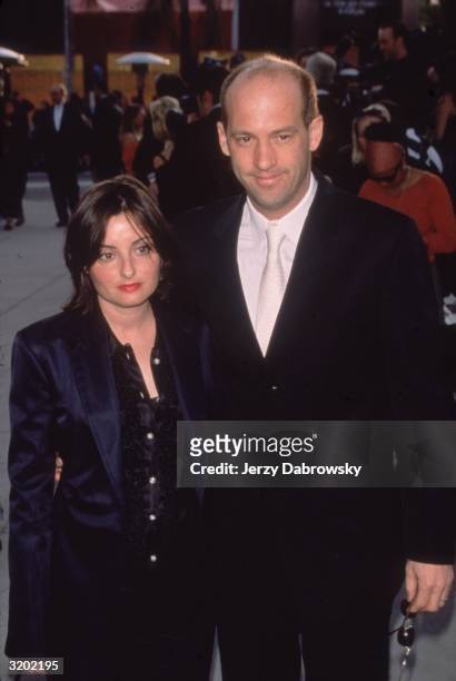 American actor Anthony Edwards and his wife Jeanine Lobell, pose at the 'Vanity Fair' Oscar Party, Morton's Restaurant, Beverly Hills, California.