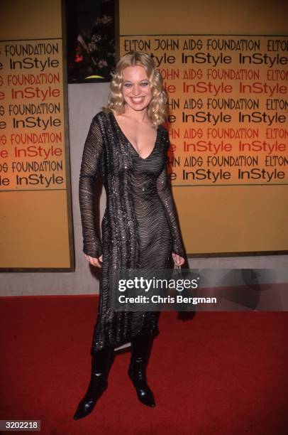 Full-length image of German-born actor Jeri Lynn Ryan posing in a long sleeved beaded dress at the Elton John/'In Style' Oscar Night Party, Beverly...