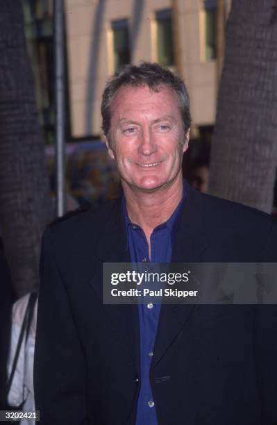 Australian actor Bryan Brown smiles while attending the premiere of director Russell Mulcahy's television film, 'On the Beach,' in which Brown...