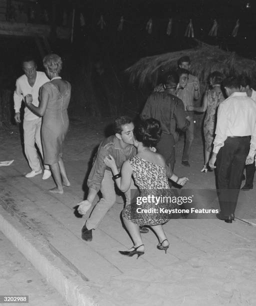 Late night revellers dancing in the Acapulco beach area of Beirut