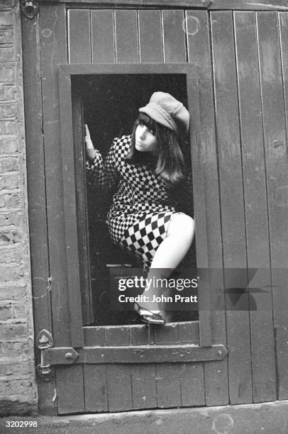 Fifteen year-old Adrienne Posta, film and television actress and pop singer. She later played roles in 'Up The Junction' and ' To Sir With Love'