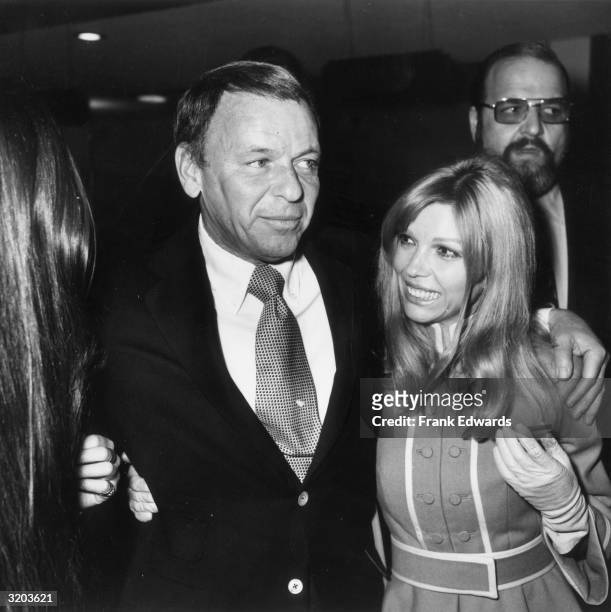 American singer and actor Frank Sinatra and his daughter, singer and actor Nancy, attend the dedication for a hospital wing named in honor of...