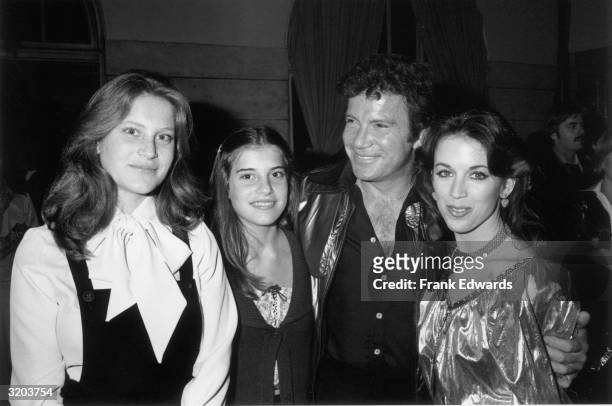 Canadian-born actor William Shatner smiles while standing with his arms around his second wife, actor Marcy Lafferty , and his daughters from a...
