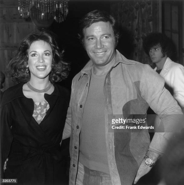Canadian-born actor William Shatner smiles while standing with arm around his second wife, actor Marcy Lafferty, at a roast in honor of stuntman Hal...