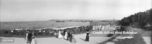 People taking the air on the seafront at Bangor in County Down.