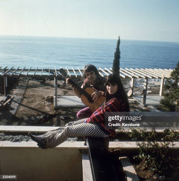 Salvatore Bono and Cherilyn Sarkasian LaPier, better known as the husband and wife duo, Sonny and Cher, at their home in California, circa 1966.