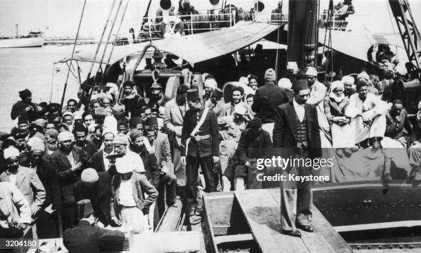 Arab refugees from Haifa, Palestine, disembarking at Port Said, Egypt.