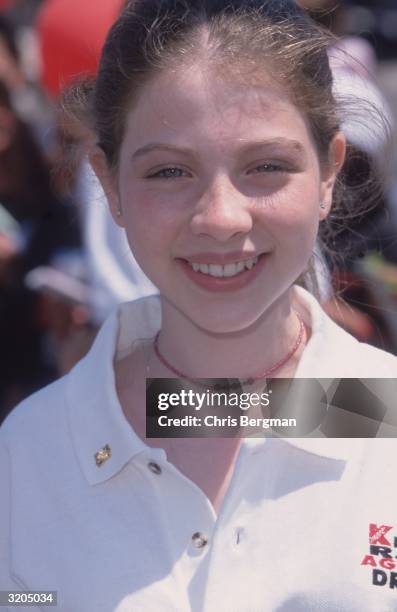 Headshot of American actor Michelle Trachtenberg attending the Kmart Kids Race Against Drugs National Celebrity Kick-Off in Carson City, California.