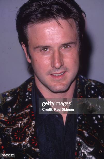 Headshot of American actor David Arquette attending the 13th annual Nickelodeon Kids' Choice Awards, which he co-hosted, at the Hollywood Bowl, Los...