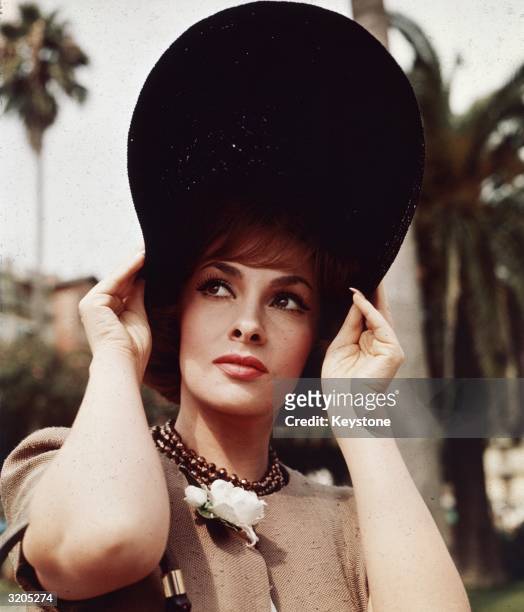 Italian film star Gina Lollobrigida in Genoa who returned to Italy for the filming of the romantic comedy 'Come September'.