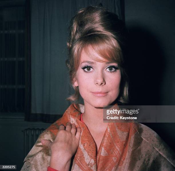 The eighteen year old French film actress Catherine Deneuve.