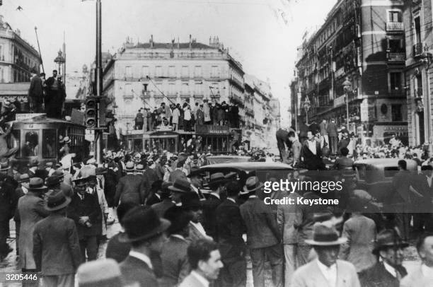Crowds in Puerta de Sol, Madrid after the Republican victory in the 1931 elections, which resulted in the declaration of the second republic and the...