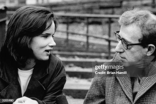 American actor Juliette Lewis and American film director, writer, and actor Woody Allen talk in a scene from Allen's film, 'Husbands and Wives'.