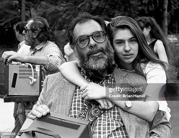 Portrait of American film director and writer Francis Ford Coppola and his daughter, writer and film director Sofia, posing on the set of the film...