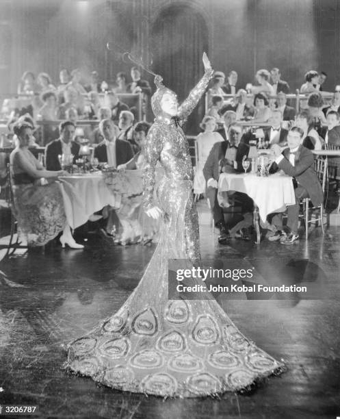 Mae Murray plays the flamboyant Cleo of Paris in 'Peacock Alley', directed by Robert Z Leonard.
