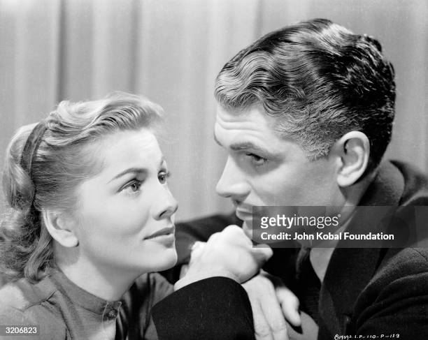 Laurence Olivier and Joan Fontaine playing Max and Mrs de Winter in Hitchcock's classic 'Rebecca'.