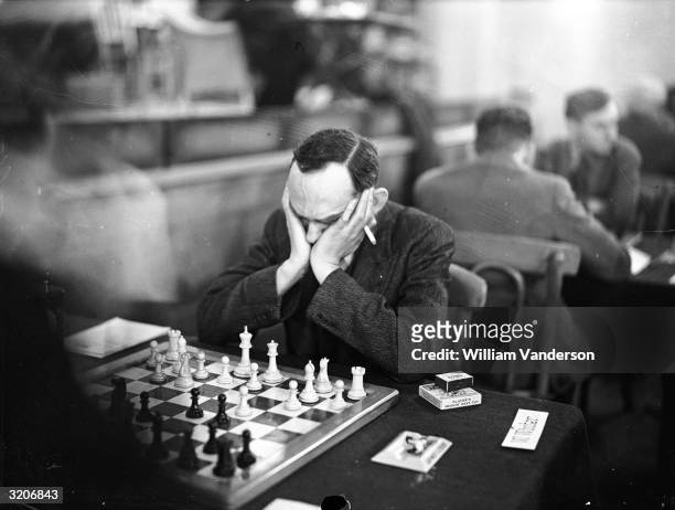 British chess player W Winter in play at the Premier Tournament of the Annual Christmas Congress of the Hastings and St Leonard's Chess Club.