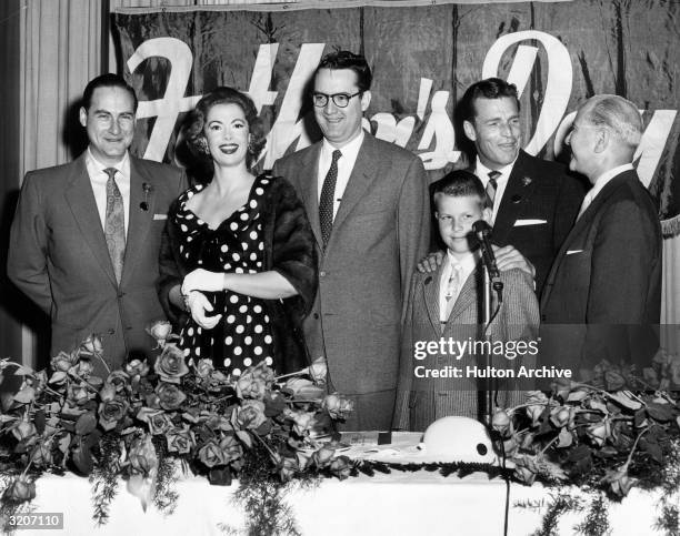 American comedian Sid Caesar, actor Jayne Meadows, her husband, television host Steve Allen, actor Buster Crabbe , and his son Cuffy line up as Alvin...