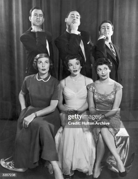 Group portrait of the cast of American comedian Sid Caesar's television series, 'Caesar's Hour'. Front, L-R : Virginia Curtis, Nanette Fabray, Ellen...