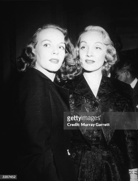 German-born actor Marlene Dietrich and her daughter Maria Riva pose together, while celebrating Dietrich's 21st year in Hollywood, California. Riva...