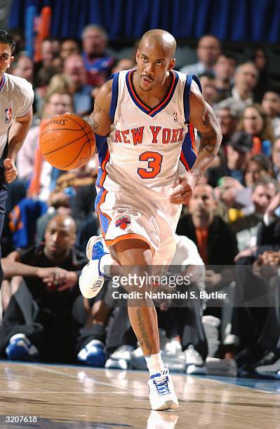 Stephon Marbury of the New York Knicks drives against the Memphis Grizzles during the game at Madison Square Garden on March 24, 2004 in New York,...