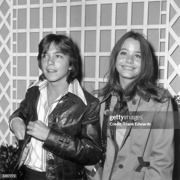 American actors David Cassidy and Susan Dey, costars of the television series 'The Partridge Family,' standing together and smiling while at an ABC...