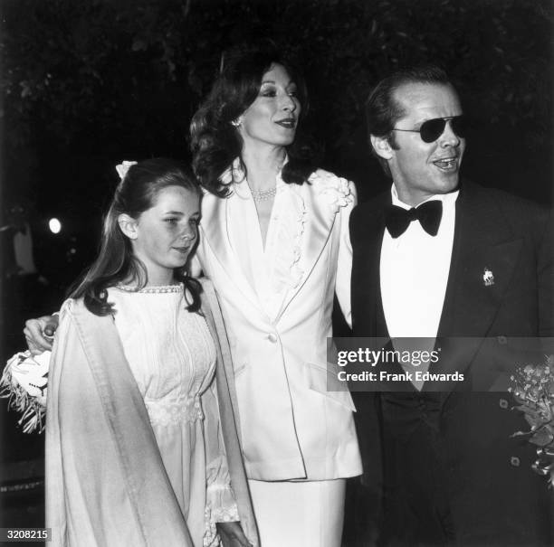 American actors Anjelica Huston and Jack Nicholson and Nicholson's daughter, Jennifer, attend the Academy Awards held at the Dorothy Chandler...