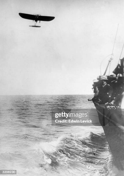 French Aviator Louis Bleriot, the first pilot to fly from Calais to Dover in a monoplane, flies across the English Channel.