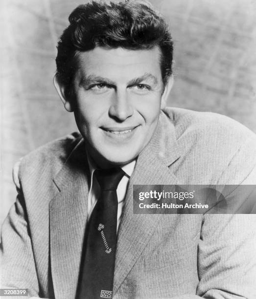 Promotional portrait of American actor Andy Griffith, of the television series, 'The Andy Griffith Show,' smiling.