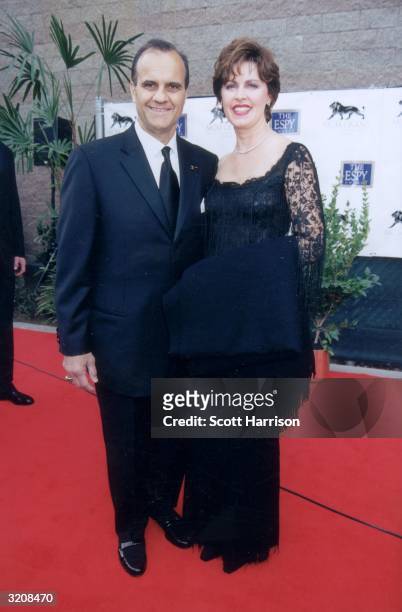 Full-length portrait of New York Yankees manager Joseph Torre and his wife, Ali, smiling while standing on the red carpet at the eighth annual ESPY...