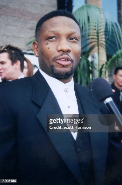 American boxer Pernell Whitaker speaks into a microphone as he is interviewed arriving at the eighth annual ESPY Awards, MGM Grand Hotel, Las Vegas,...