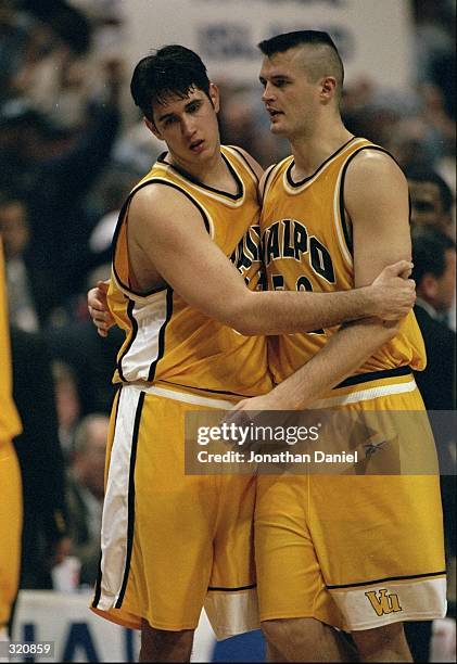 Centers Zoran Viskovic and Antanas Vilcinskas of the Valparaiso Crusaders in action during an NCAA Tournament game against the Rhode Island Rams at...