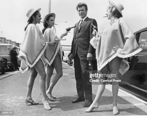 American actor Clint Eastwood finds himself at the mercy of three gun-toting gals upon his arrival at London Airport to promote his latest film. From...