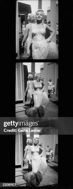 Contact sheet showing three full-length photographs of American actor Marilyn Monroe posing in a white beaded gown on the parking lot of the 20th...