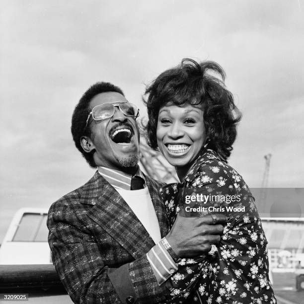 Entertainer Sammy Davis Jr. And his wife, singer Altovise Gore, arriving at Southampton on the QEII during their honeymoon.