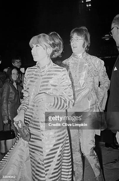 John Lennon , with his first wife Cynthia, at the London Pavilion Cinema to see the premiere of director Richard Lester's film, 'How I Won the War,'...
