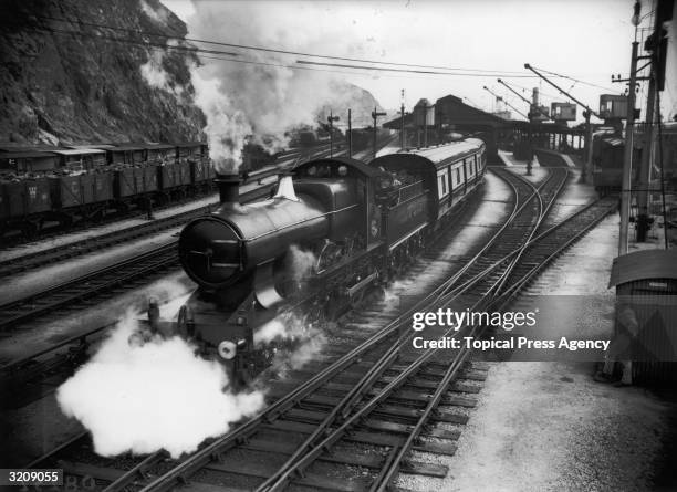 The Great Western Railway boat train, taking passengers to the Mauretania, leaving Fishguard station.